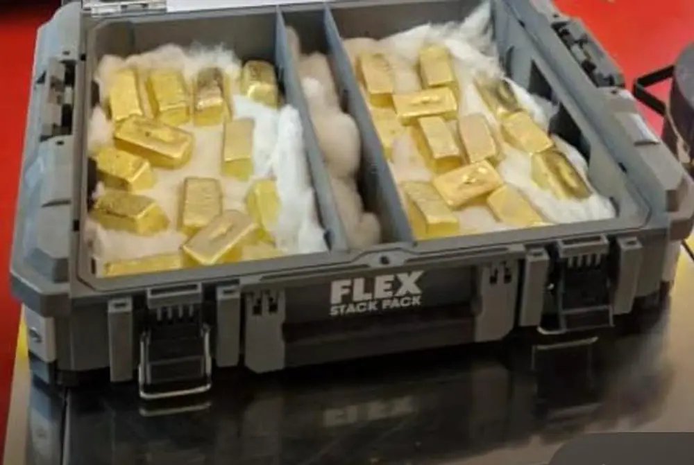 Gold bars secured in a case for laboratory review