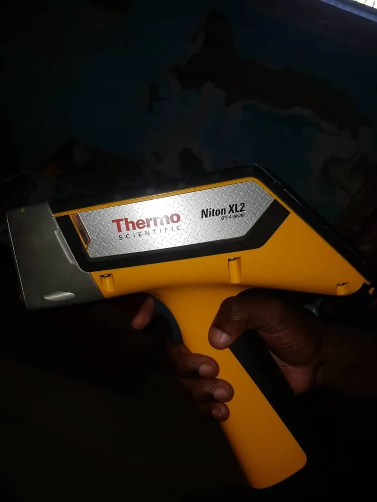 Handheld XRF analyser used for non-destructive gold screening